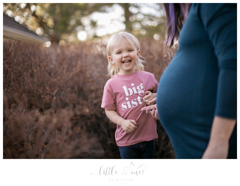 big sister, sibling, maternity session, baby bump, pink shirt